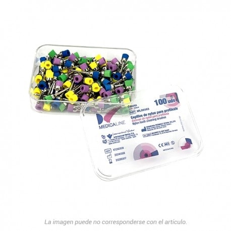 Alto texto: Capsulas de protección bucal para prótesis dentales, en diversos colores, en caja de almacenamiento transparente, ideal para odontólogos y clínicas dentales.