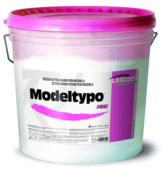 Modelado dental con yeso extradura en color rosa para modelos odontológicos personalizados, ideal para clínicas y laboratorios.