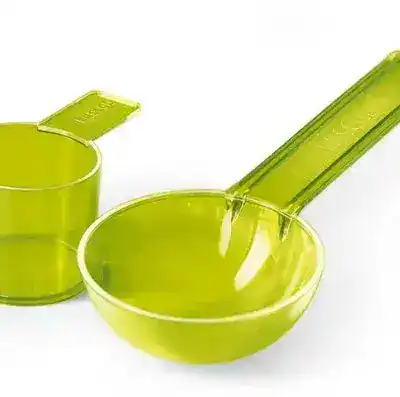 Cazos medidores de precisión para productos odontológicos personalizados en color verde translucido.