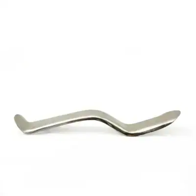 Preparador de encías odontológico personalizado en acero inoxidable para tratamientos dentales.