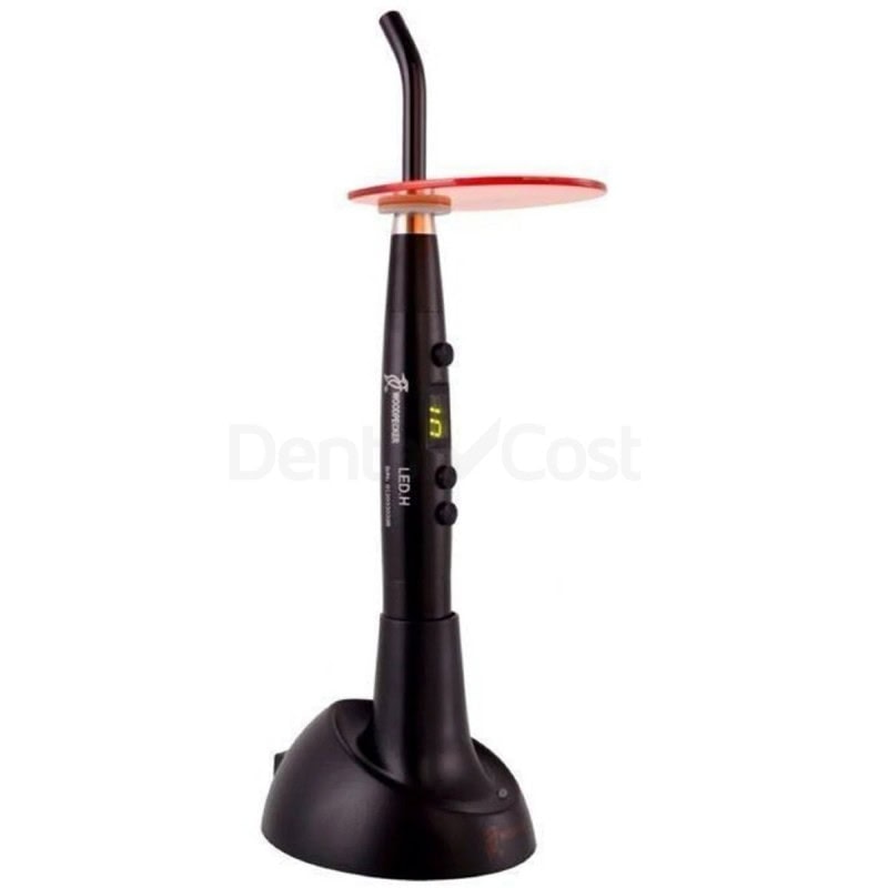 Microcargador LED para odontología, diseño ergonómico y portátil, ideal para restauraciones dentales con técnica avanzada, compatible con diferentes tipos de implantes y prótesis dentales.