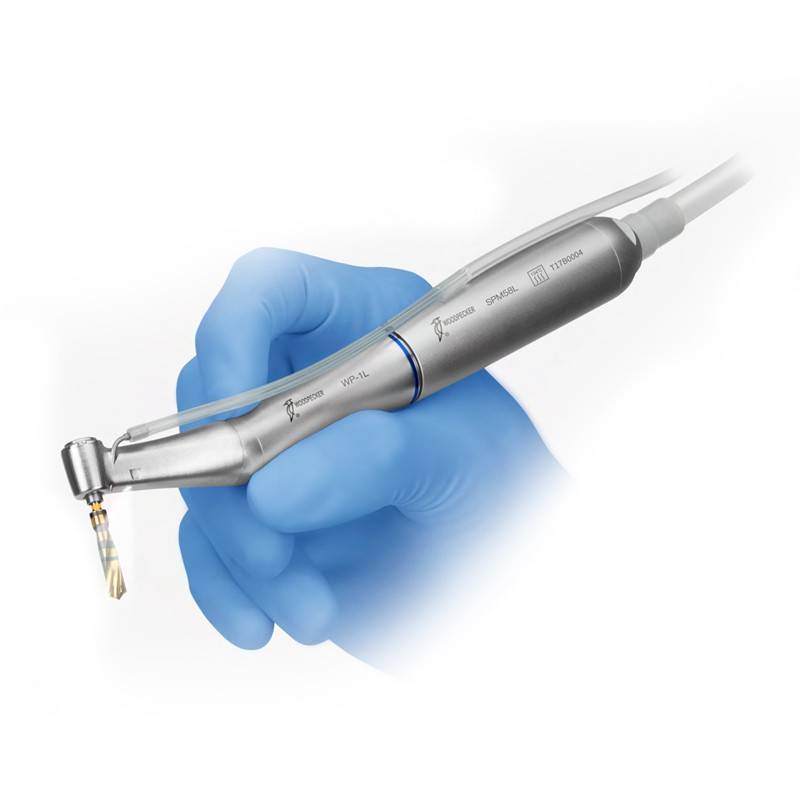 Arquivador de mano para odontología con punta intercambiable y diseño ergonómico, ideal para procedimientos dentales precisos y personalizados.