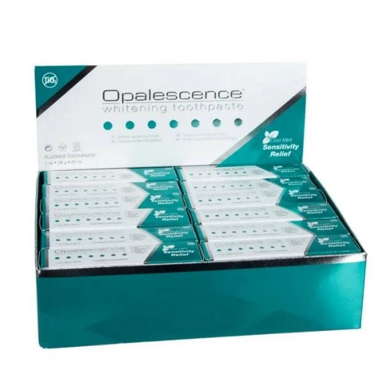Opalescence blanqueador en pasta dental, sensibilidad y alivio, packaging en caja con varias unidades, producto odontológico personalizado y eficaz para blanqueamiento dental.