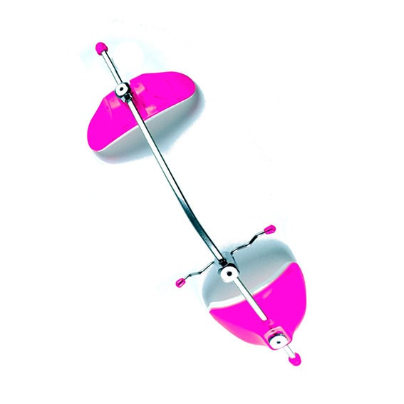 Titulador dental personalizado con partes en rosa y blanco para odontología innovadora.