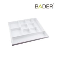 Plato dispenser para instrumentos dentales, ideal para clínicas odontológicas, con compartimentos para organización y esterilización.