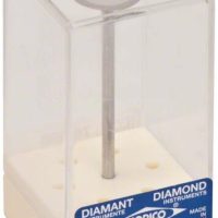 Cápsula de material transparente para almacenamiento odontológico, con tornillo metálico y etiqueta con marca Diamant con instrucciones en alemán y detalles técnicos.