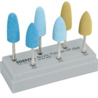 Polvos de pulido acrílicos para odontología, en colores azul y beige, ideales para restauraciones dentales y acabados precisos en clínicas odontológicas.