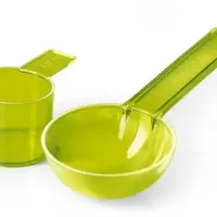 Cazos medidores de precisión para productos odontológicos personalizados en color verde translucido.