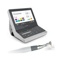 Alt: Equipo dental de alta tecnología para restauraciones odontológicas personalizadas, incluyendo un láser y una pantalla táctil para un uso preciso y eficiente.