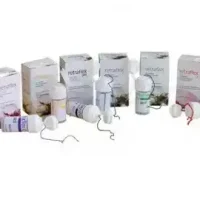 Personalizados productos odontológicos Refitape y Retradex de EXAmedic en envases con boquillas y cajas.